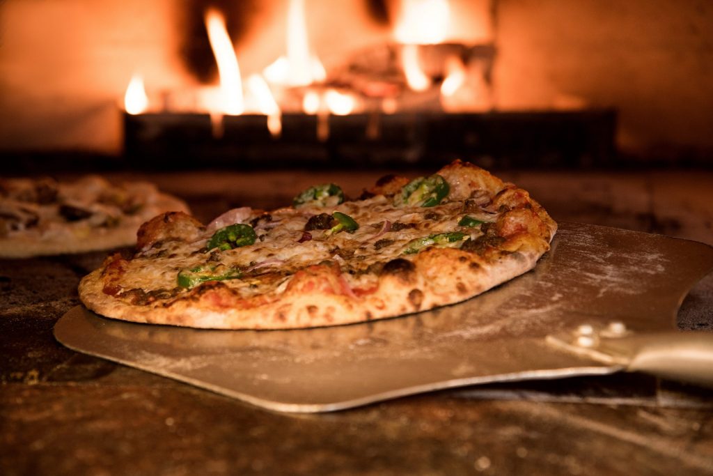 Pizza Bild einer Holzofenpizza